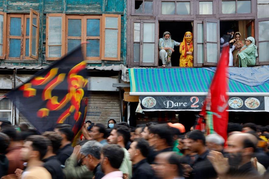 Muharram procession carried out by mourners from Shite community at Rainawari