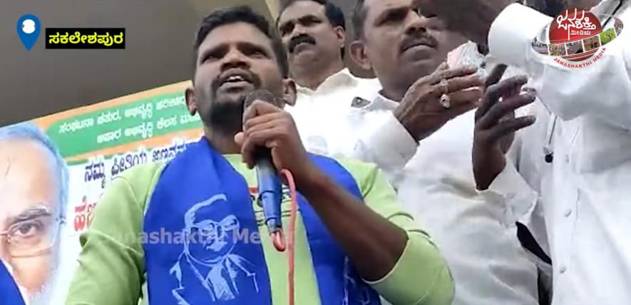 Manjunath addresses the rally in Sakleshpur which was held in solidarity with him