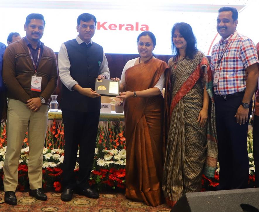 Veena George, the minister for health and family welfare of the government of Kerala received the best-performing state award from Mansukh Mandaviya, the union health minister (Courtesy: https://www.facebook.com/veenageorgeofficial)
