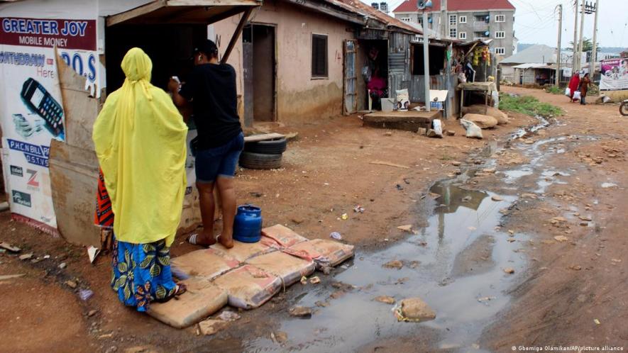 Open sewage, like that seen here in Nigeria's capital Abjua, makes it hard to defeat cholera