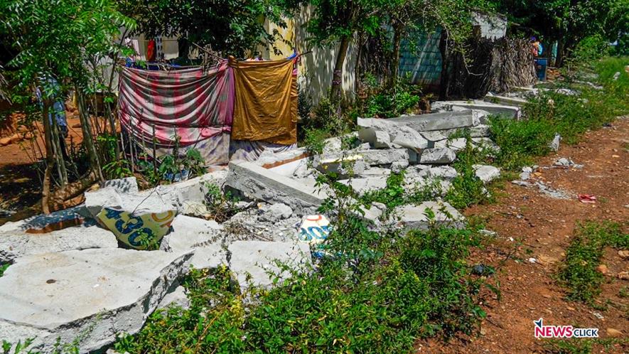 The demolished wall, which was close to the huts of the Kattunayakan community in in Valavanthankottai village.