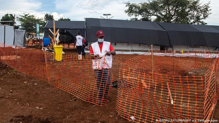 Members of an NGO set up an Ebola treatment isolation unit at the Mubende regional referral hospital in Uganda