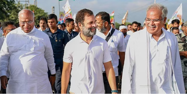 Congress leader Rahul Gandhi with party leaders Mallikarjun Kharge and Bhupesh Baghel during the party's 'Bharat Jodo Yatra', in Ballari