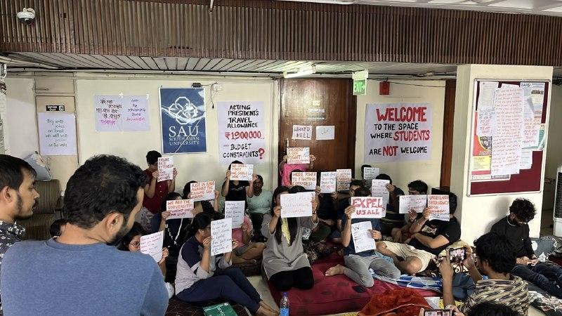 Students of SAU occupy the lobby of the administration floor at Akbar Bhawan, which currently houses the university. Image courtesy: special arrangement