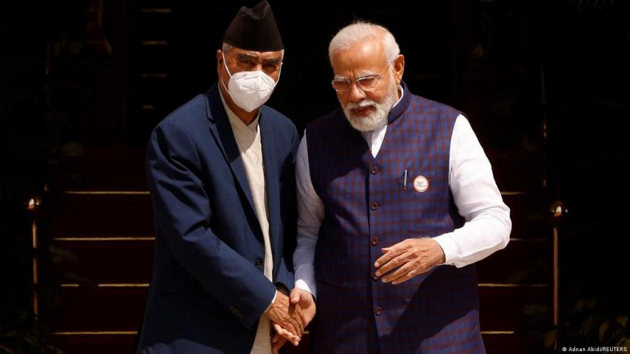 Nepal maintains strong ties with India. Here Prime Minister Sher Bahadur Deuba is seen with Indian counterpart Narendra Modi