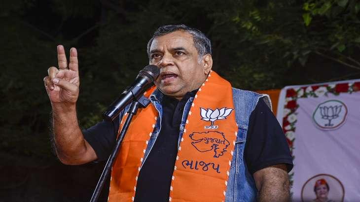  Bollywood actor and former BJP MP Paresh Rawal addresses an election campaign rally for the Gujarat Assembly elections, in Surat on Monday