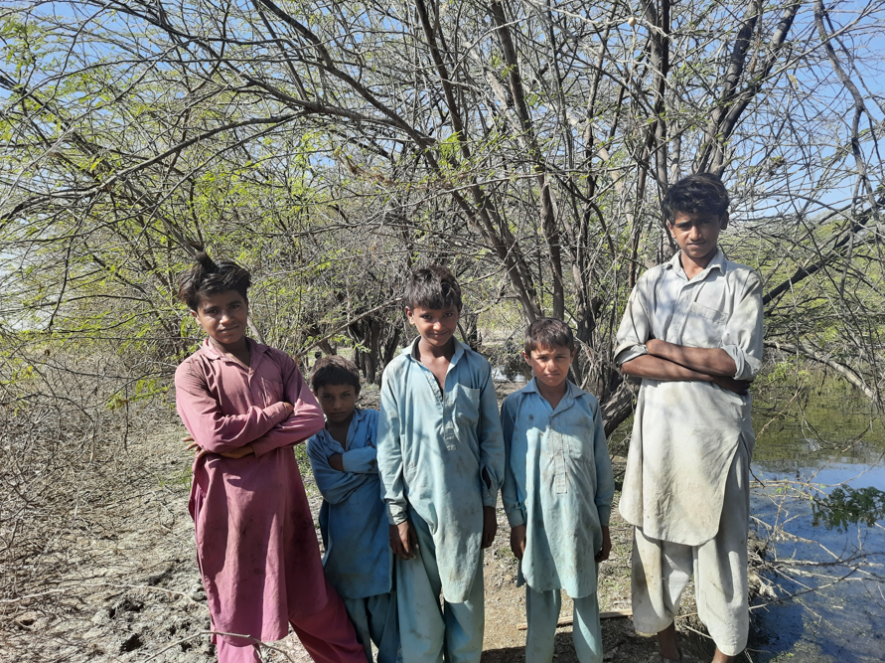 Five students of a village in Banni. The eldest of them in standing in the middle and has dropped out of school post his 8th grade. Others also plan on following his suit.