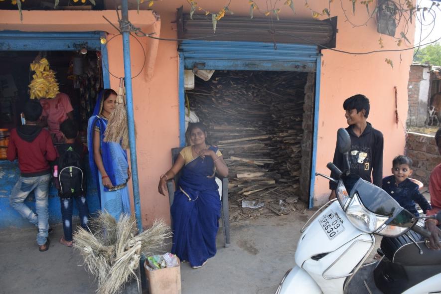 Women in Indore slums prefer firewood to cooking gas due to its easy and cheap availability.  