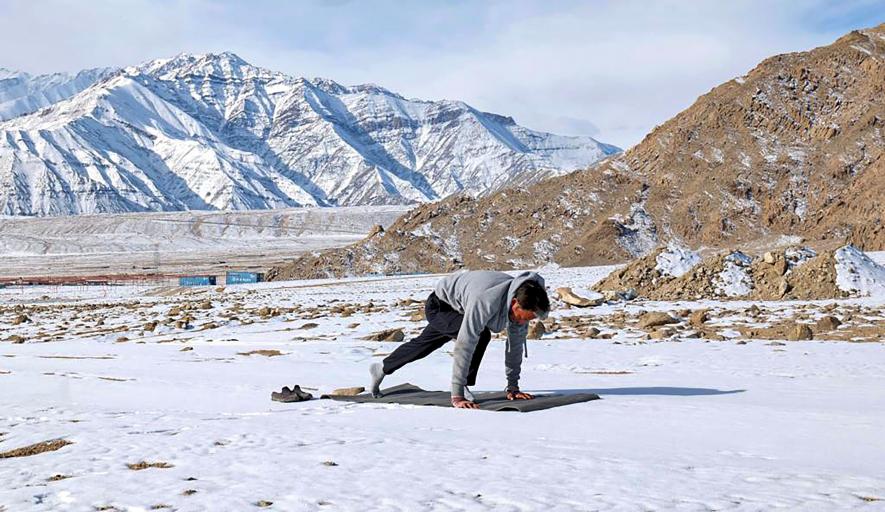 Social reformist Sonam Wangchuk does 'yoga' on the 3rd day of his five-day climate fast to “save Ladakh” in in Phyang, Saturday, Jan. 28, 2023.