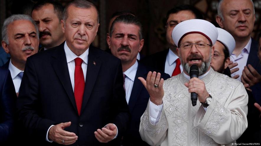 Erdogan with Diyanet President Ali Erbas: Religion and politics remain entwined in Turkey despite its avowed 'laicism'