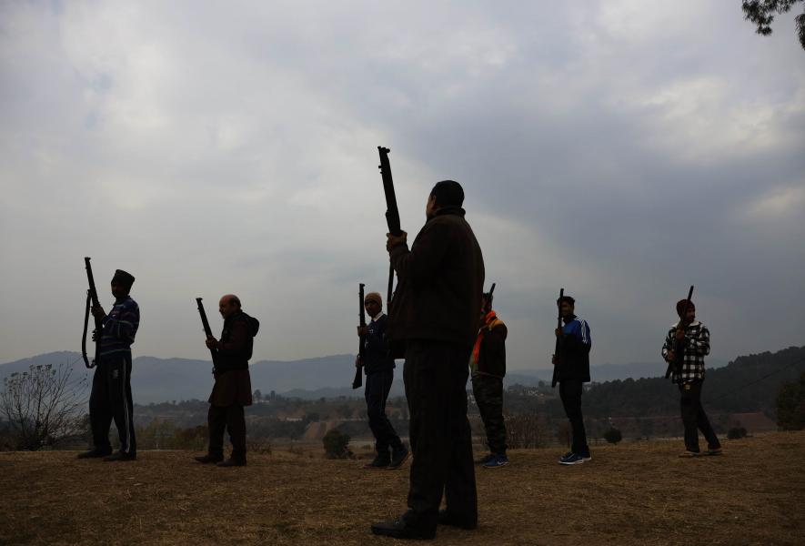 A former army official teaching VDG members how to use weapons in the Roujori village of Androla in Jammu(Photo by Kamran Yousuf).