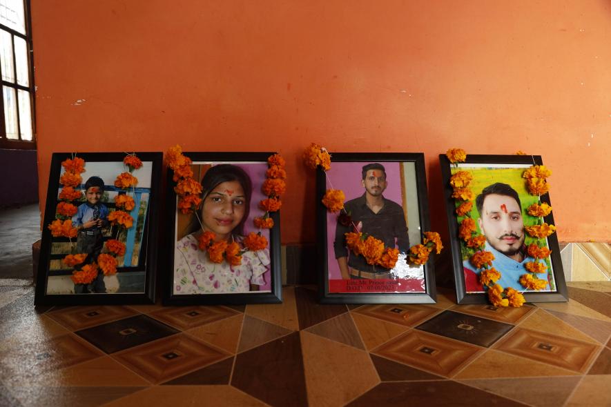 The garlanded portraits of the four family members who died in the dangri attack(Photo by Kamran Yousuf).
