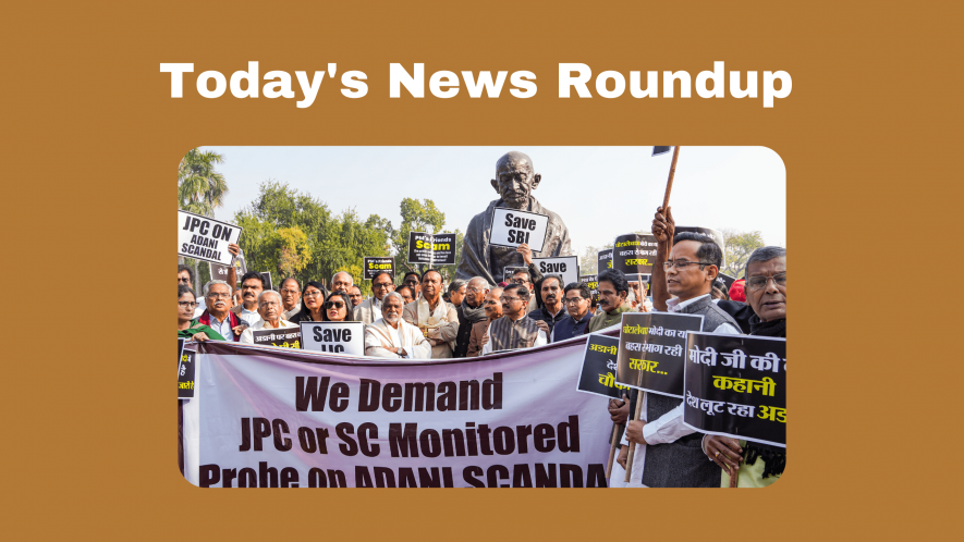 Opposition parties' MPs stage a protest over Adani row at the Gandhi statue in the Parliament complex, in New Delhi, Monday, Feb. 6, 2023.