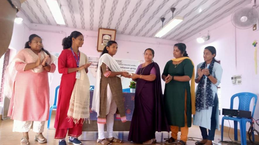 The president of the Palakuzha village panchayat, Jaya K A distributed menstrual cups to the residents of the LSG. (Courtesy: Jaya K A)