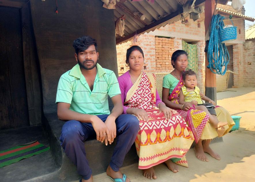 Migrant labourer Milan Saren with his wife Kalpana, mother Chintamani and three-year-old son Sherma in Kulyam village, Ranibandh block, Bankura.
