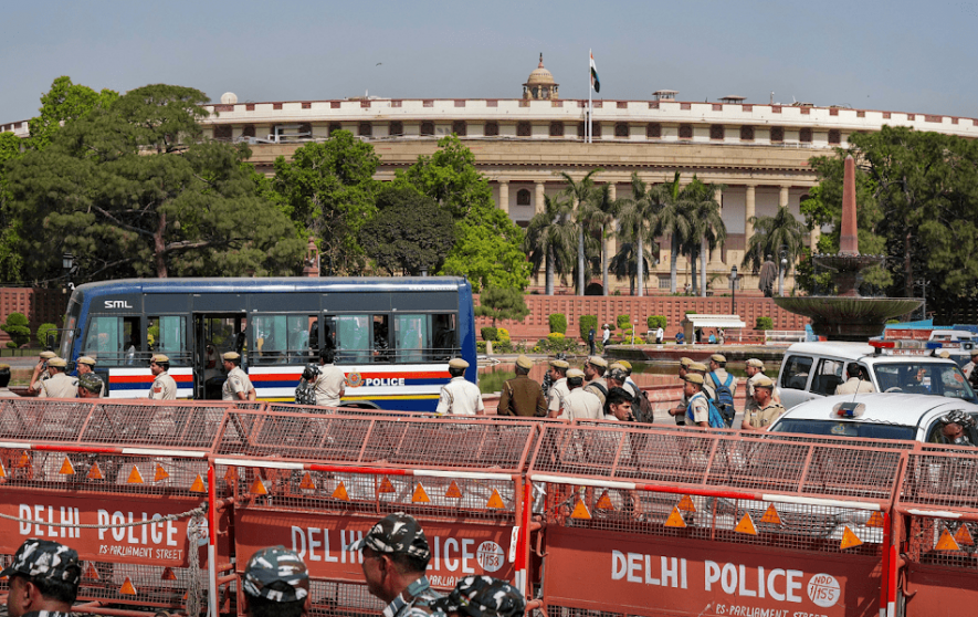 Security personnel deployed near Parliament House ahead of the Opposition leaders' protest march from Parliament House to the Enforcement Directorate (ED) office, in New Delhi, Wednesday, March 15, 2023.