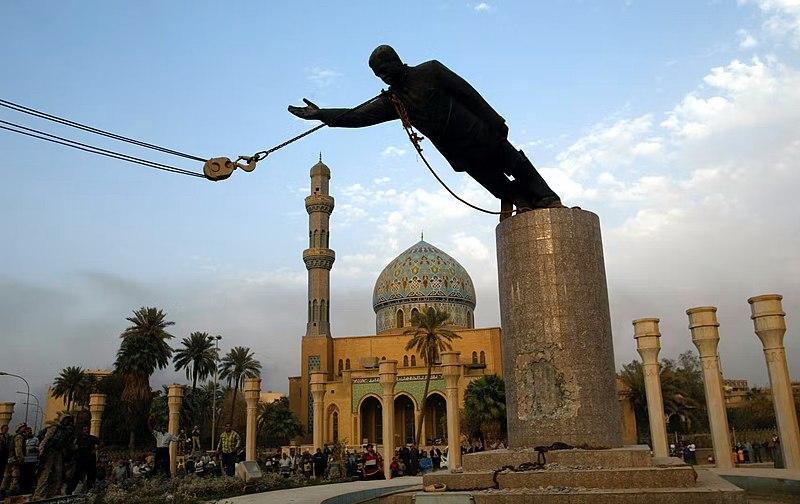 Statue of Saddam Hussein being toppled in Firdos Square after the US invasion of Iraq.