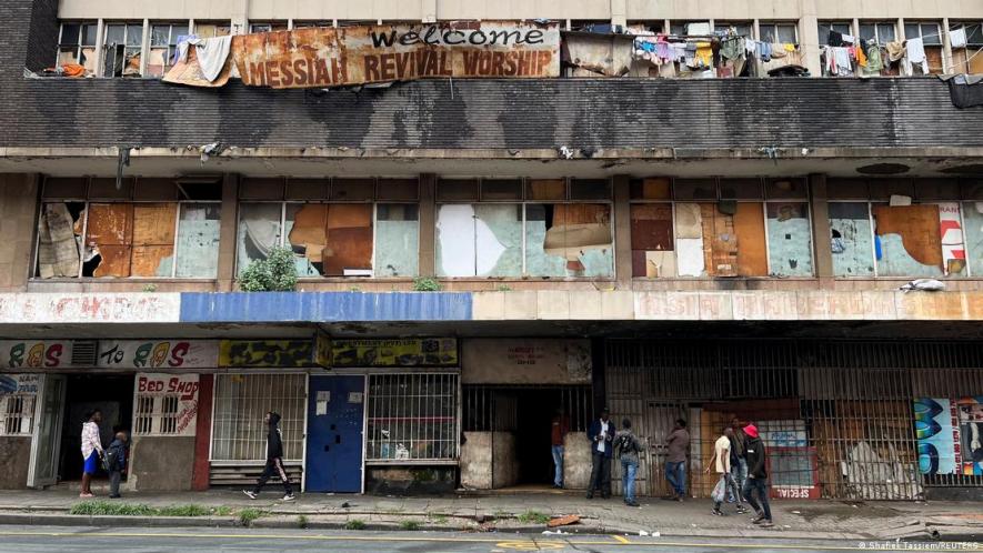 In Johannesburg's improvrished inner-city district of Hillbrow, the lights remain off for hours each day
