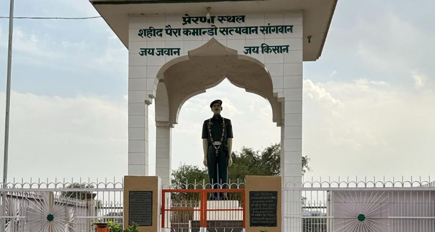 At the entrance to the village, a memorial statue for fallen para-commando Satyawan Singh who died in the line of duty (Photo - Sat Singh, 101Reporters