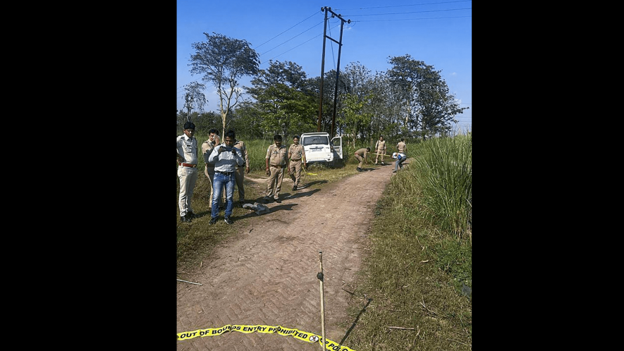 Police near the encounter site where dreaded gangster Anil Dujana was shot dead by the U.P. STF, near Ganganahar in Meerut district, on May 4, 2023.