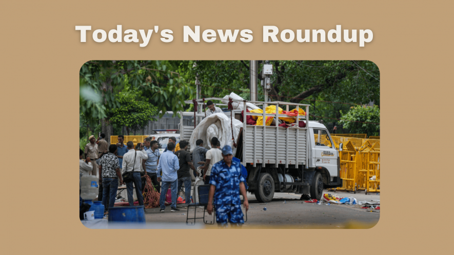 Authorities clear the site of the wrestlers protest at Jantar Mantar, in New Delhi, Sunday, May 28, 2023. The police officers began clearing the protest site by removing the cots, mattresses, coolers, fans and the tarpaulin ceiling along with other belongings of the wrestlers.