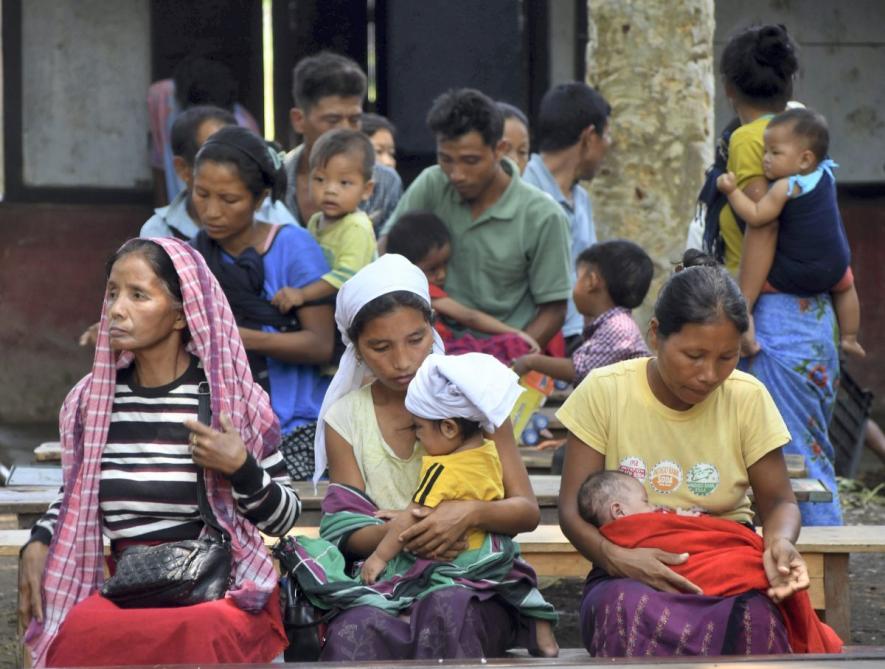 People from the violence-hit areas of Manipur at a relief camp set up by the Assam government, in Cachar district of Assam. 