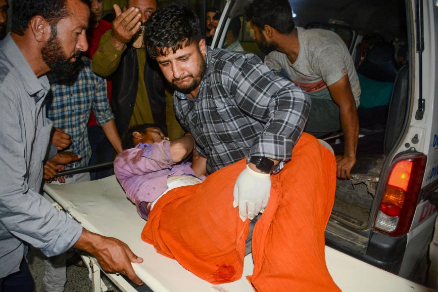 An injured non-local labourer being brought to SMHS hospital for treatment after he along with two others was shot at by militants in J&K's Shopian, in Srinagar, Thursday, July 13, 2023.