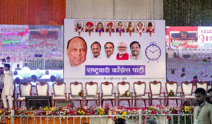  A hoarding bearing a photo of Nationalist Congress Party (NCP) chief Sharad Pawar put up at the venue of the meeting of Ajit Pawar-led NCP, in Mumbai, Wednesday, July 5, 2023. Both factions of NCP led by Maharashtra Deputy Chief Minister Ajit Pawar and NCP chief Sharad Pawar have called for separate meetings of party MLAs.