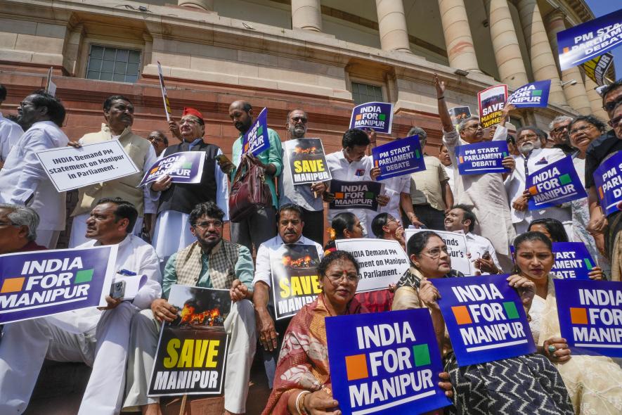 Leaders of the INDIA alliance parties stage a protest over ethnic violence in Manipur during Monsoon session of Parliament, in New Delhi, Monday, July 24, 2023. (PTI Photo/Shahbaz Khan