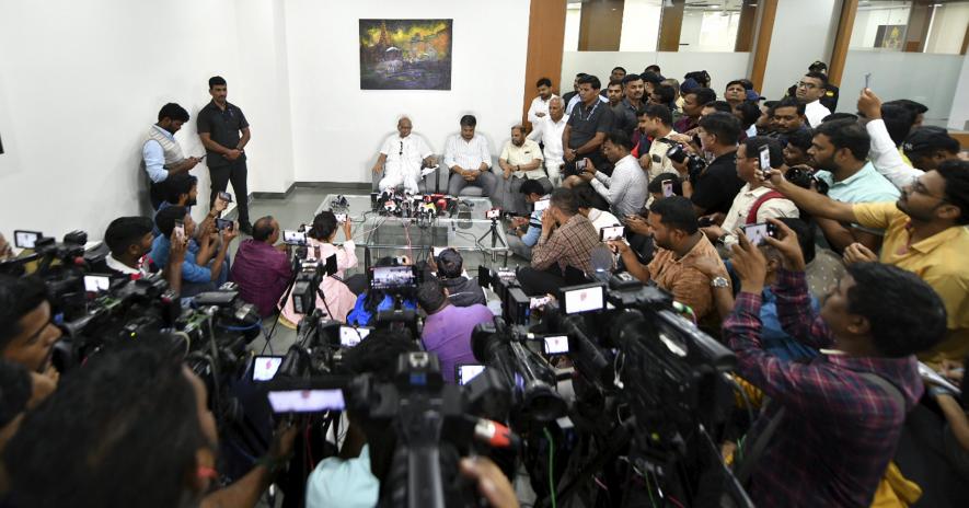 ationalist Congress Party (NCP) President Sharad Pawar with party MLA Rohit Pawar during a press conference at his residence, in Pune, Sunday, July 2, 2023.