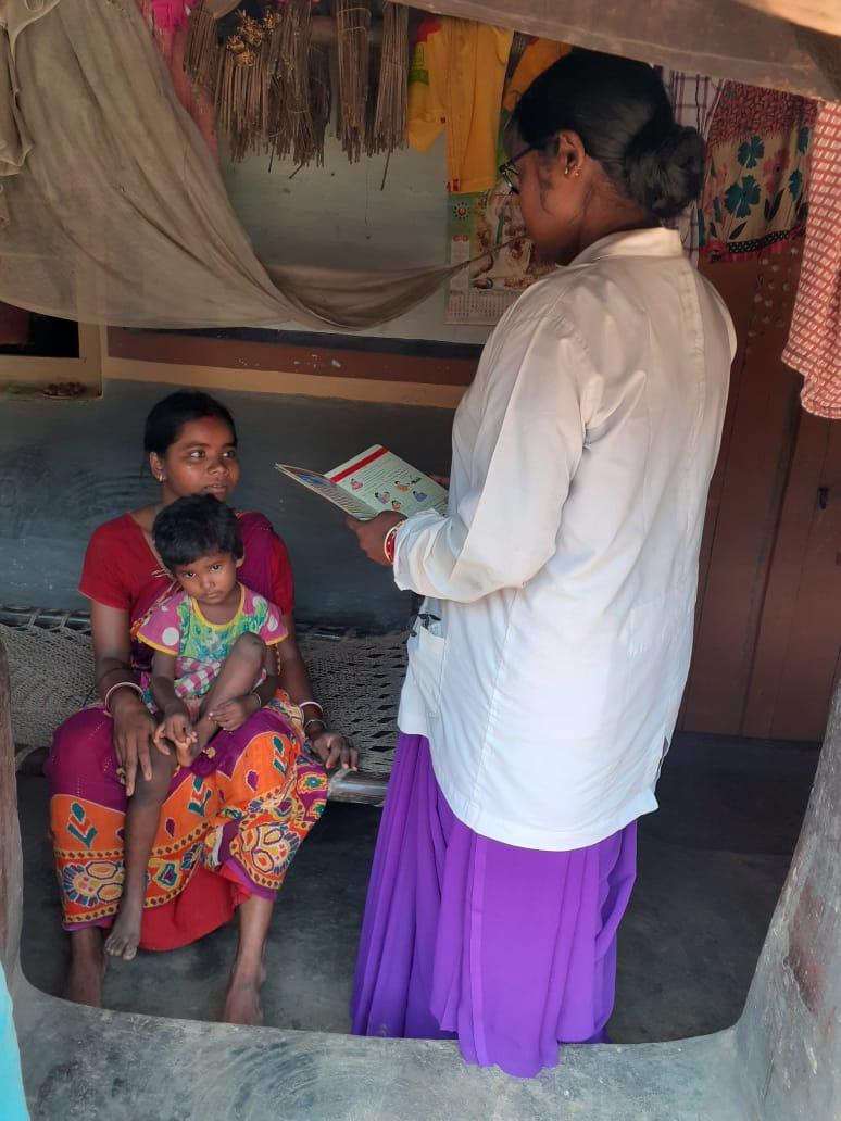 ASHA worker Malati Hembram routine visits the house of Mamani   Hembram in Bagdubi village, Ranibandh  to check the health of the mother and child