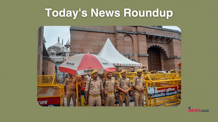 Police personnel stand guard at the Gyanvapi mosque, in Varanasi, Thursday, Aug. 3, 2023.
