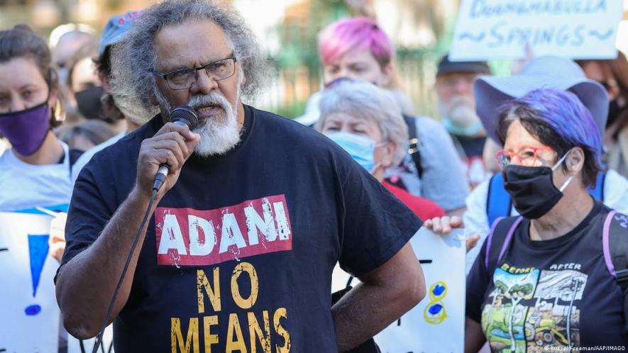 Tribal leader Adrian Burragubba speaks during a rally at Queensland Parliament in Brisbane
