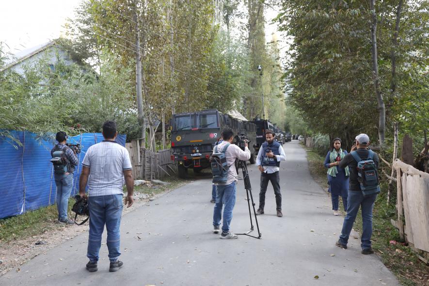Local and national journalists were seen reporting from Ground Zero on the second day of the encounter.