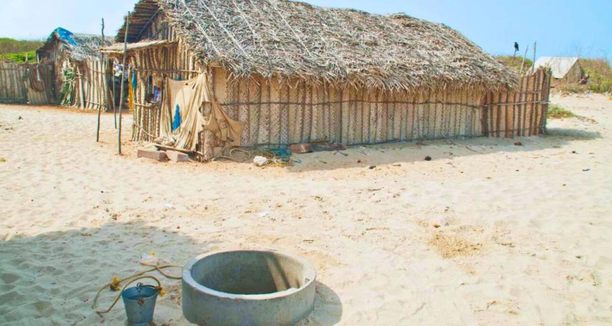 Houses in the sand and their only source of water in Dhanushkodi settlement (Photo - Prasanth Muthuraman, 101Reporters).