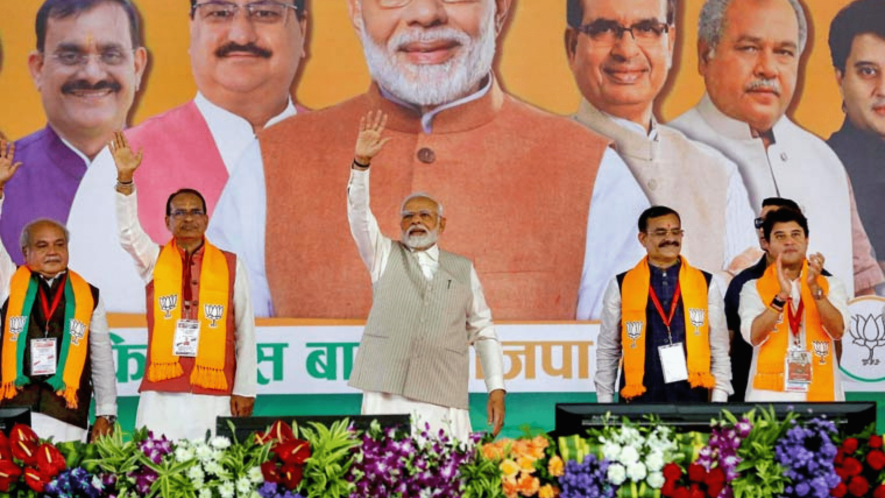Prime Minister Narendra Modi waves at supporters during BJP's 'Karyakarta Mahakumbh', in Bhopal, Monday, Sept. 25, 2023