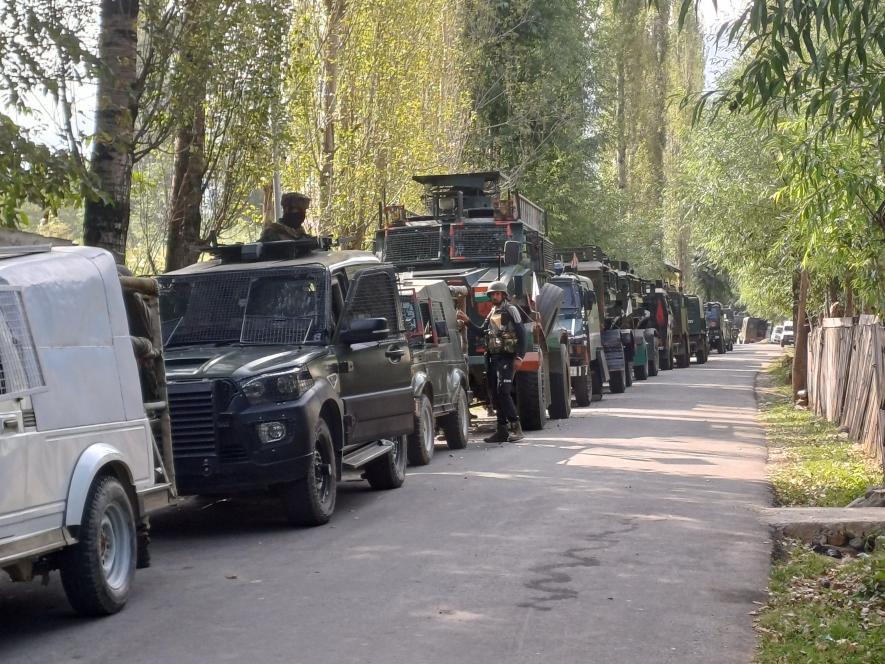 Security personnel cordon off the area after 3 Army men were killed in a gunfight with terrorists at Kokernag area, in Anantnag district, Thursday, Sept. 14, 2023.