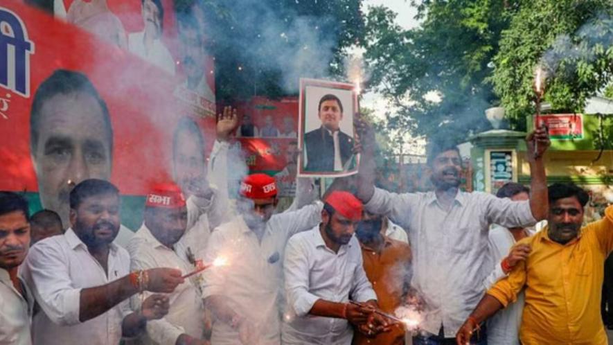 - Samajwadi Party workers celebrate the victory of party candidate Sudhakar Singh in the Ghosi constituency by-election, in Lucknow, Friday, Sept. 8, 2023. 