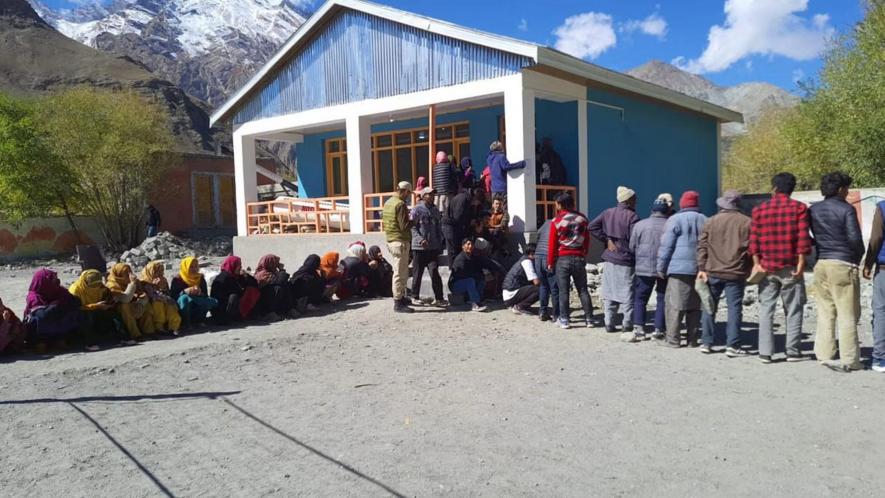 voters waiting to cast votes for the 5th LAHDC Kargil elections, in Kargil, Wednesday.