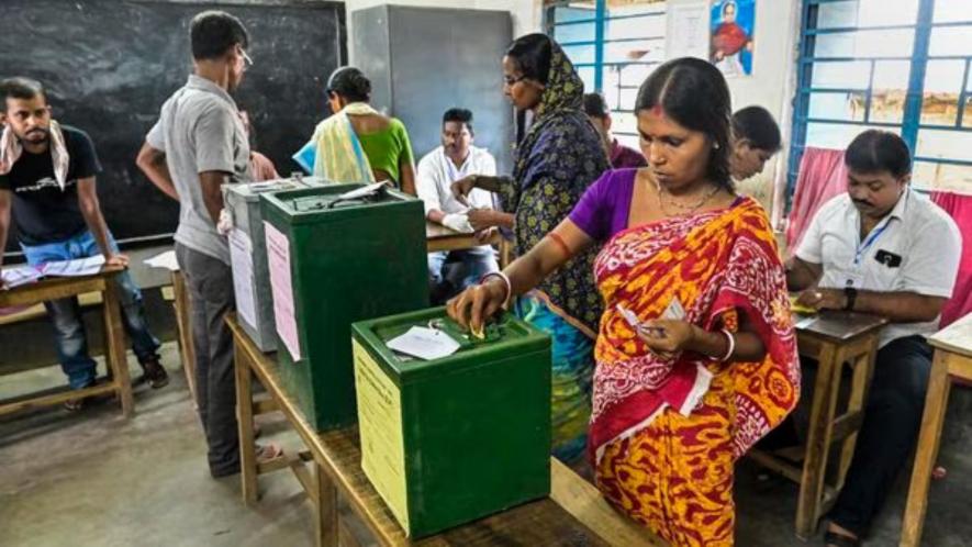 Women cast their votes for Panchayat elections at a polling station, in Nadia district of West Bengal, Saturday, July 8, 2023 