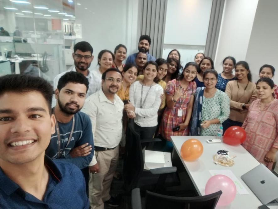 Celebrating Gurupournima this year with her labmates.