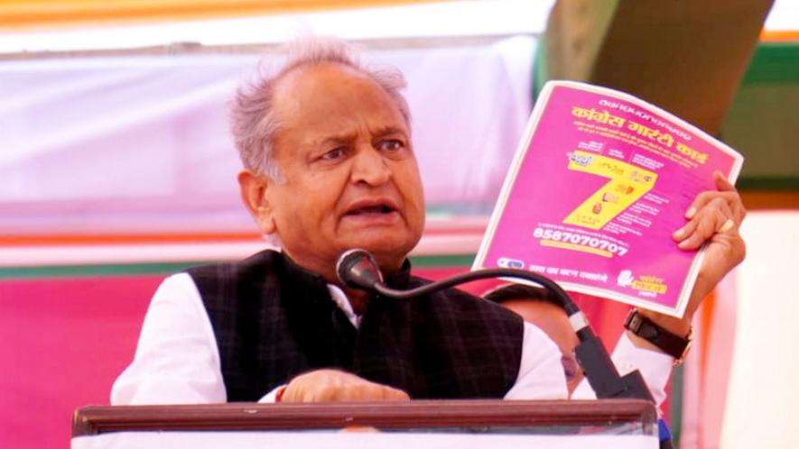 Rajasthan Chief Minister Ashok Gehlot addresses during a public meeting ahead of State Assembly elections, in Bharatpur, Saturday, Nov. 18, 2023.