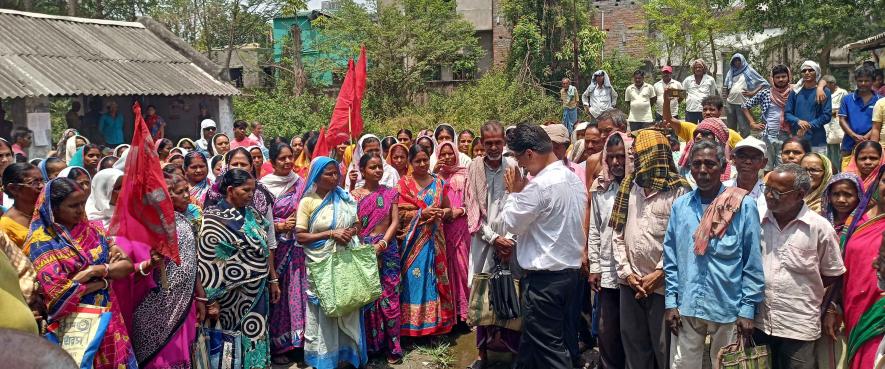 Left front candidate of Bankura constituency Nilanjan Dasgupta in  campaigning with beedi workers at Bankura cooperative factory.