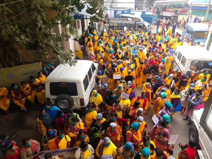 ANM 2 and ASHA health workers demanding their job security at CMOH office premises in Bankura.