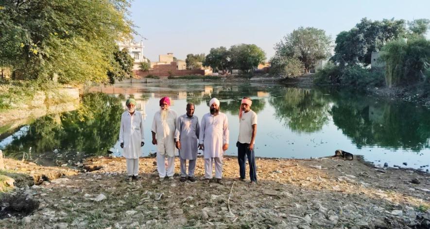 Villagers showing the dilapidated pond in Burj village of Maur block of Bathinda district (Photo - Amarpal Singh Verma, 101Reporters)