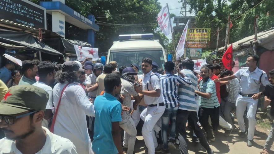  Left students and youths protest on August 15 morning by holding back the  body of a nurse who died mysteriously in a nursing of Singur, Hooghly