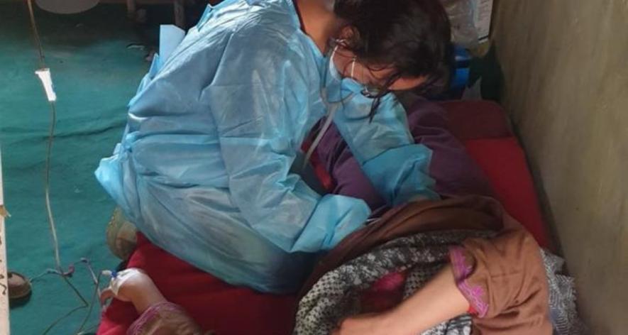 Dr. Padma screening women during an outreach program (Photo - Safeena Wani, 101Reporters)