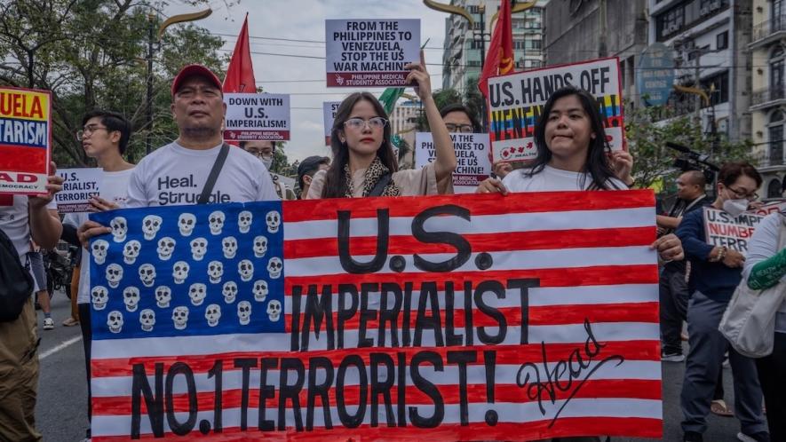 Progressive organizations led by Bagong Alyansang Makabayan along with the Philippines-Bolivarian Venezuela Friendship Association marched to the US embassy, denouncing the United States’ aggressive military attacks on Venezuela. Photo: Bulatlat