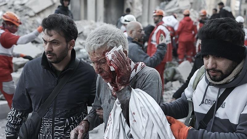 US-Israeli strikes on Tehran’s Enqelab Square. Photo: Press TV