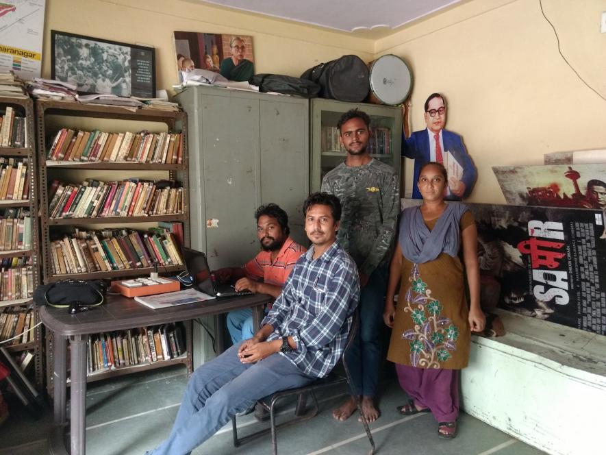 Atish Indrekar and others inside Chharanagar library established by Mahaswheta Devi.jpg